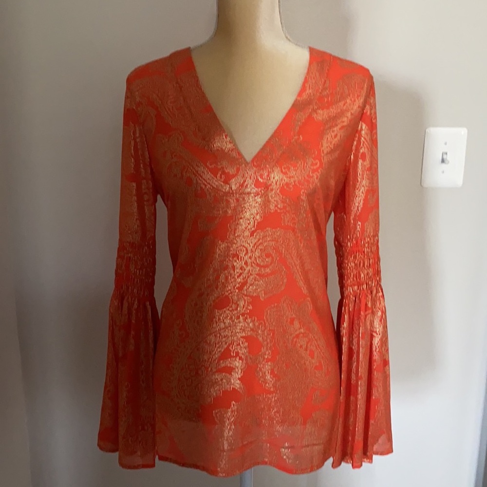 Brand New. Size S. Orange w/Gold Design.